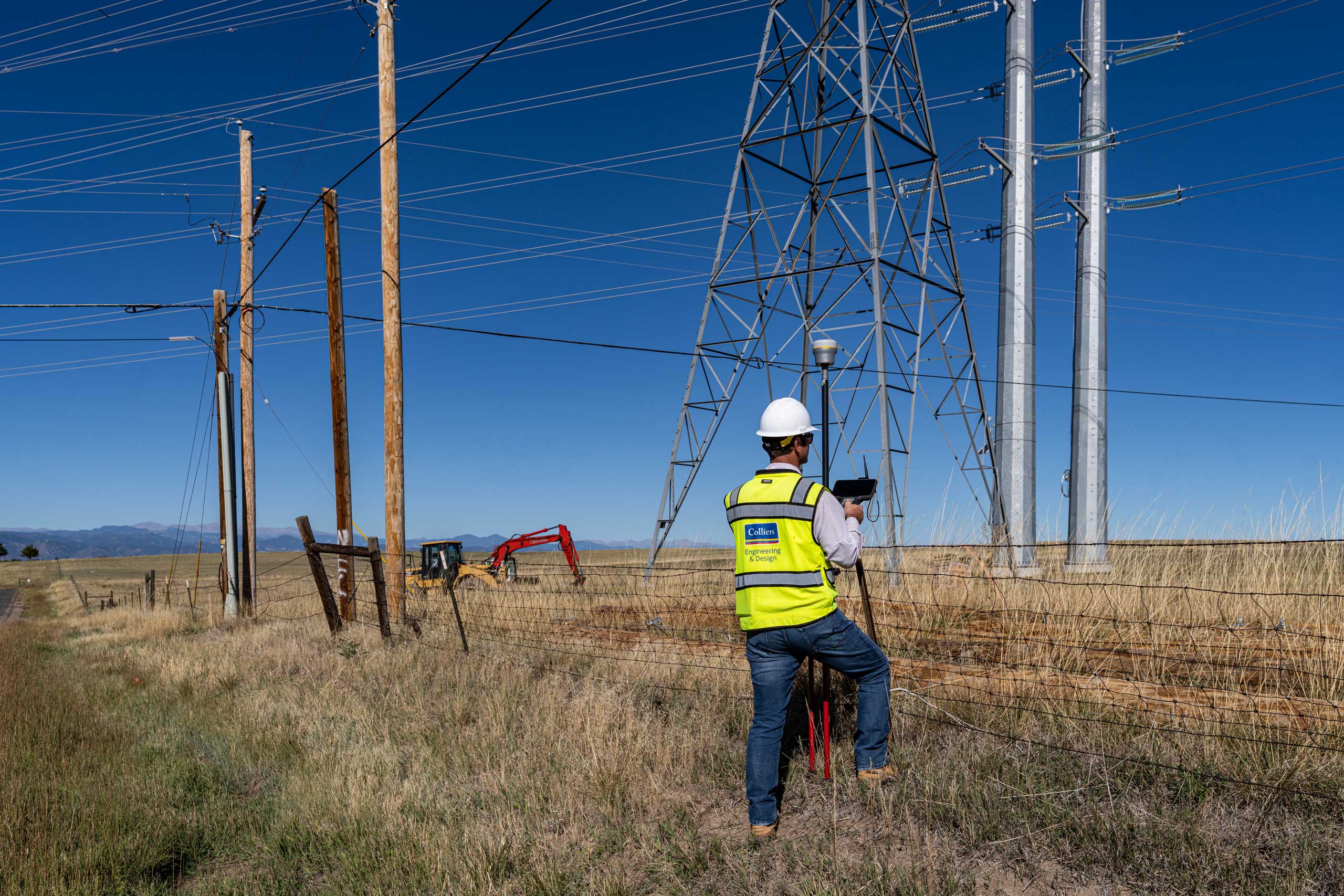 Land surveyor performing a survey in the field