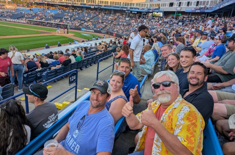 Coworkers at a baseball game